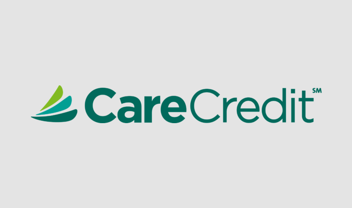 CareCredit logo featuring green leaf icon and teal text on gray background.